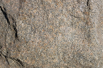 Аbstract background of granite stone surface close up.