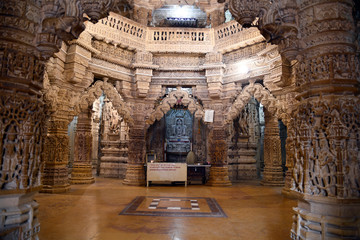 Shri Mahaveer Jain temple, heavily decorated columns and bracketed arches, inside Golden Fort, Jaisalmer, Rajasthan, India - obrazy, fototapety, plakaty