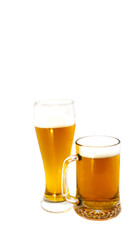 A mug and a glass of light beer on a white background