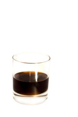 Glass of whiskey on a white background