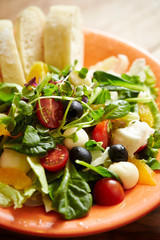 Mozzarella cheese salad with bread 