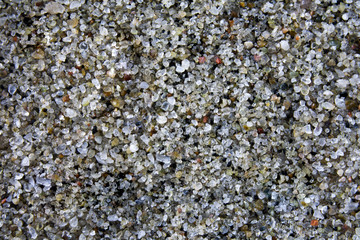 Marine multi-colored sand in the approximation