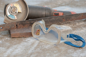 Angle grinder cutting disc element stuck in safety glasses