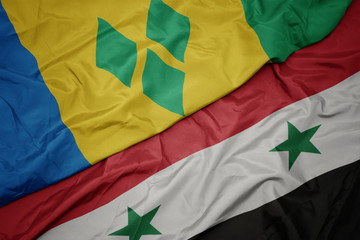 waving colorful flag of syria and national flag of saint vincent and the grenadines.