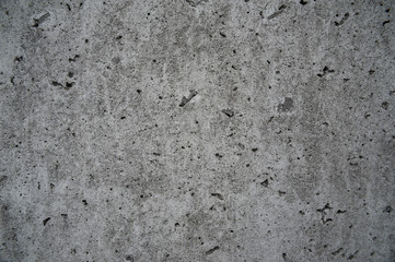 Surface of dark grey concrete wall.