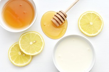 Honey, lemon and yogurt, ingredients for facial mask, natural skin treatment.