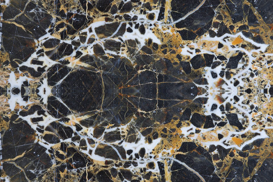 Yellow and white patterned structure of dark marble pattern background for design product, abstract texture.