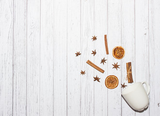 Christmas background. Cinnamon, oranges and other decorations. Top view. Winter / New Year concept