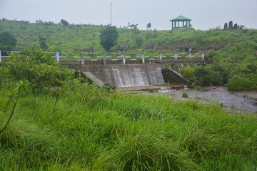 The pavilion or Gazebo in the background and a small dam in the foreground of  Cherrapunjee Eco...