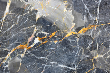 Patterned natural of dark gray marble pattern (Russia Gold) background for design. Abstract texture.