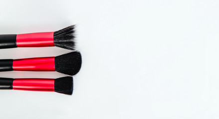 Make-up brush on bright white background. Fashion and beauty concept. Taking care of yourself,...