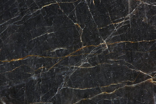 Patterned natural of dark gray marble (Gold Russia) texture background for product design