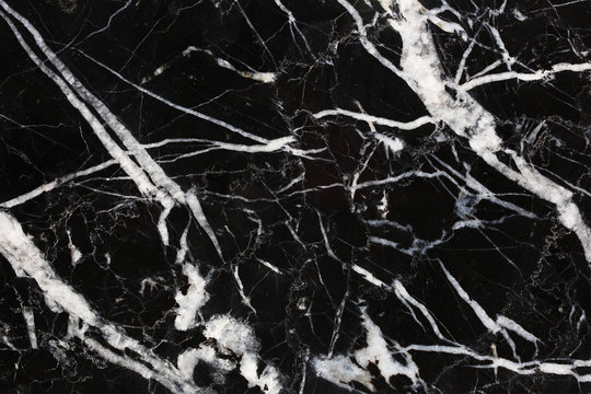 White pattern structure of black Marquina marble texture background for interior or product design