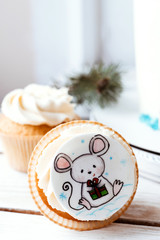 New Year's cake. Symbol of 2020 mouse. Christmas sweet background.
