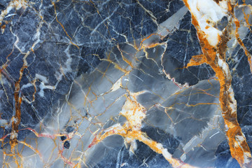 Yellow Patterned natural of dark gray marble pattern (Russia Gold) background texture for design.