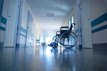 Medical wheelchair in the hospital corridor. - 307143965