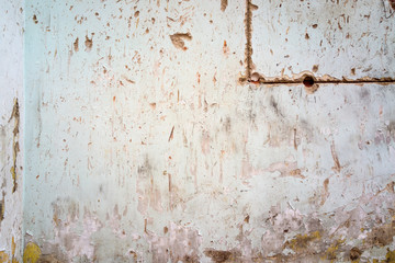 cracked and peeling paint and grunge old wall with texture