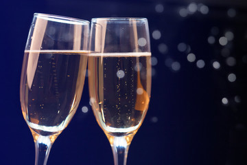Two champagne glasses ready to bring in the New Year