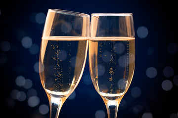 Two champagne glasses ready to bring in the New Year