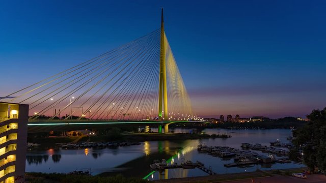 Day to night time lapse of Ada suspension bridge in Belgrade