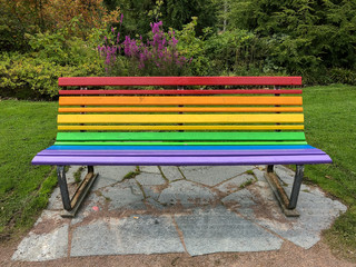 Front View of Rainbow Park Bench on Stone Foundation