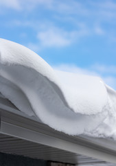 Snow drift on a roof top.