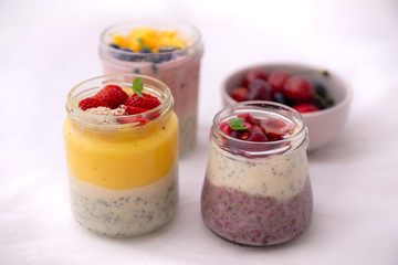 Chia pudding and fresh fruit smoothie, mango, berry, cherry