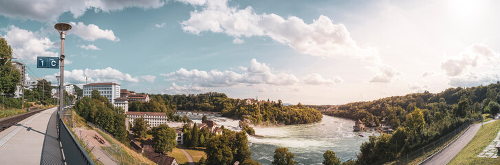 Fototapeta na wymiar Panoramic view with the Rhine Falls in Neuhausen am Rheinfall