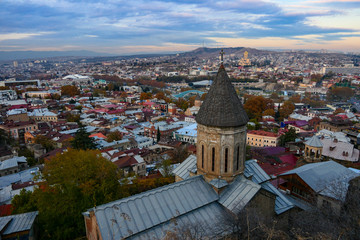 Fototapeta na wymiar Tbilisi, Georgia A view over the old town at sunset.