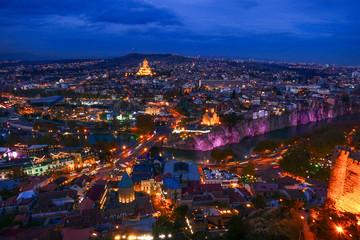 Tbilisi, Georgia The city at dusk and the Holy Trinity Cathedral of Tbilisi in the background.