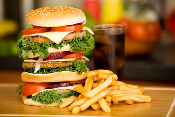 Huge hamburger with french fries
