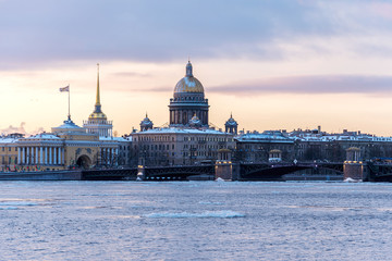 St. Isaac's Cathedral, the Admiralty and Palace bridge over the Neva river Snowy