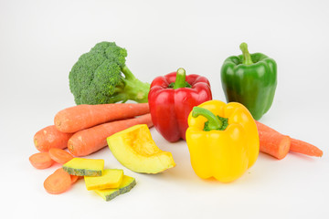 Fototapeta na wymiar Carrots, pumpkin,Broccoli,sweet pepper, bell pepper on white background
