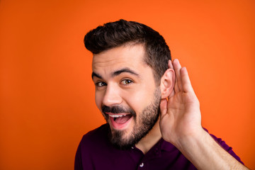 Close up photo of cheerful handsome interested funny man eavesdropping private conversation...