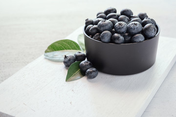 blueberries on wood white background