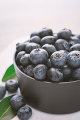 blueberries on wood white background