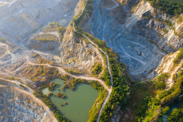 Aerial view of the large mine that exploded the mountains for the mining and construction industry..