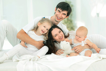 Fototapeta premium background image of a happy young family