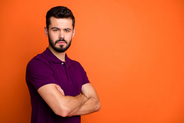 Turned photo of serious minded guy successful lawyer cross hands look feel he can solve start up problems wear good looking outfit isolated over orange color background