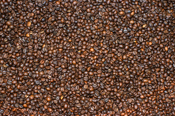 Roasted coffee beans background.Mixture of different kinds of coffee beans. Coffee concept.
