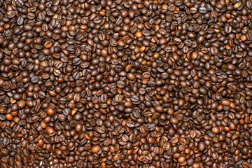 Roasted coffee beans background.Mixture of different kinds of coffee beans. Coffee concept.
