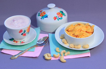 Vegetarian Breakfast consisting of cornflakes, nuts and yogurt