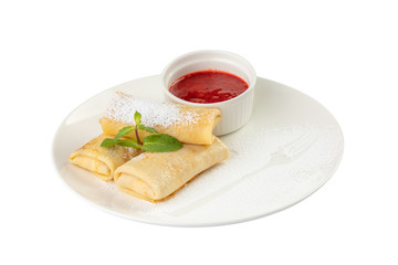 Pancake with jam and sprig of mint.