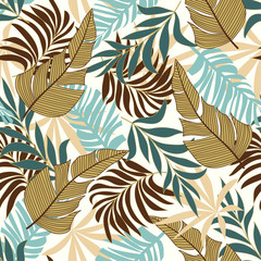 Trend seamless tropical pattern with bright green and yellow plants and leaves on white background. Printing and textiles. Exotic tropics. Summer.   Beautiful exotic plants. 
