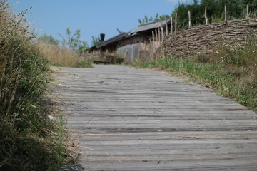 Fototapeta na wymiar wooden bridge over river