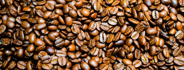 Close up roasted coffee beans background for banner