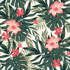 Seamless pattern with tropical leaves and flowers. Exotic wallpaper, Hawaiian style. Jungle leaves vector floral pattern background. Botanical pattern. Trendy hand drawn textures.