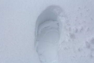 Fußabdruck im Schnee