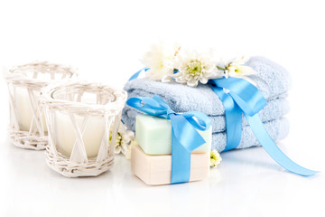 Blue face towels and candles