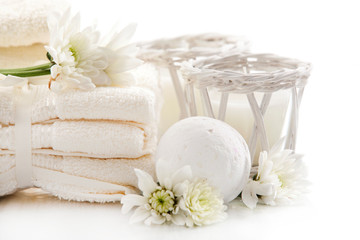 White face towels and candles